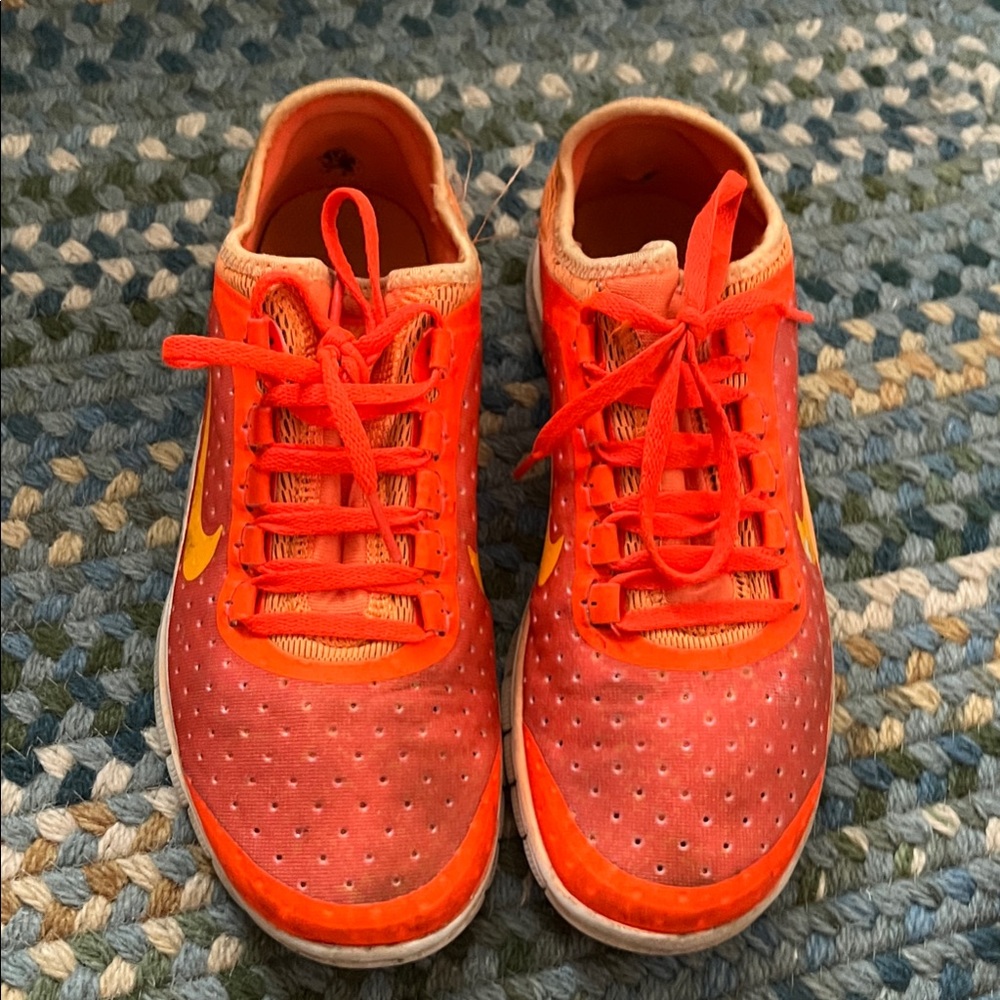 Nike women Orange and Red Sneakers